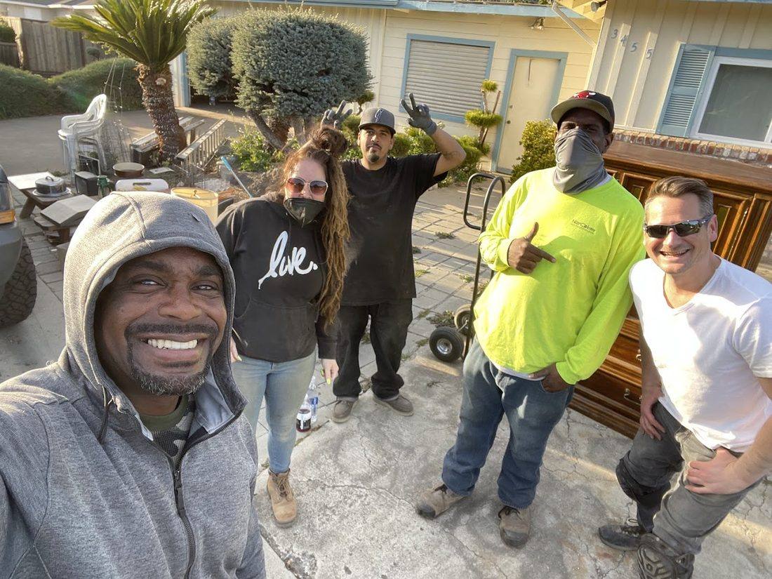 The Junk'it Hauling crew on a residential clean-out job